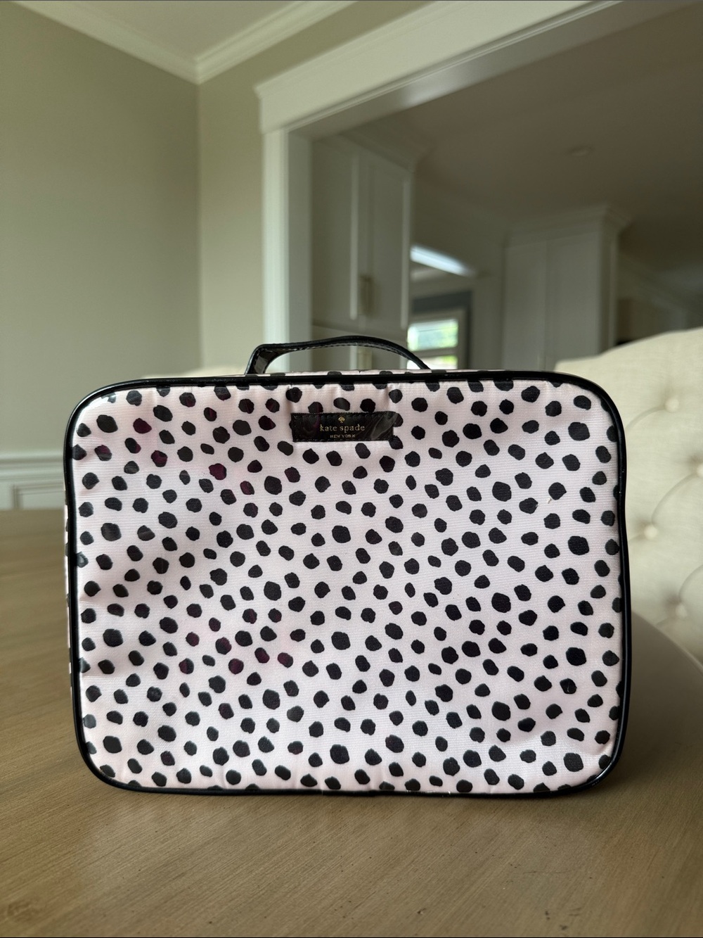 kate spade pink and black spotted cosmetic travel case